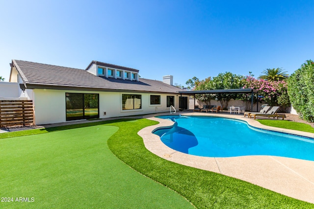 view of swimming pool featuring a patio area