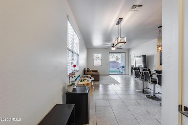 interior space featuring ceiling fan