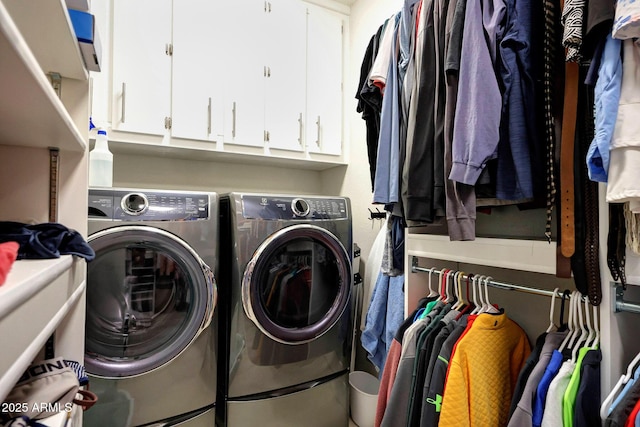 19745 N Mountain Sage Ln, Surprise, AZ 85374 - laundry area featuring washer and clothes dryer and cabinet space