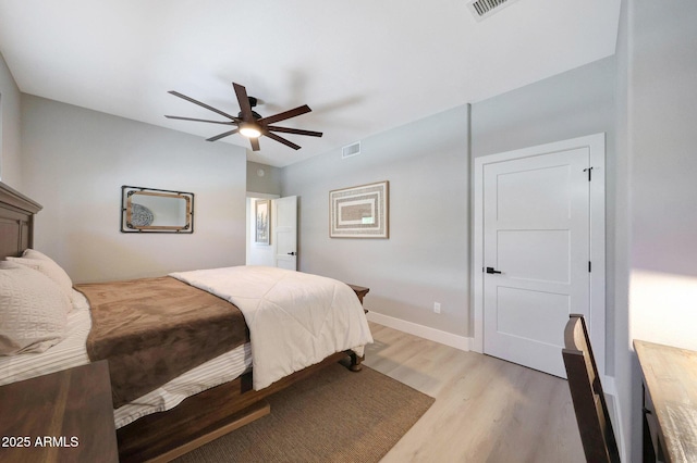19745 N Mountain Sage Ln, Surprise, AZ 85374 - bedroom with light wood-type flooring and ceiling fan