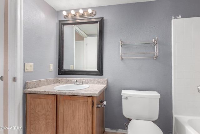 full bathroom with vanity, toilet, and shower / tub combination