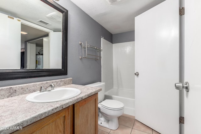 full bathroom featuring tile patterned flooring, vanity, toilet, and washtub / shower combination