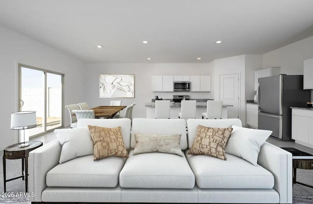 living area featuring recessed lighting