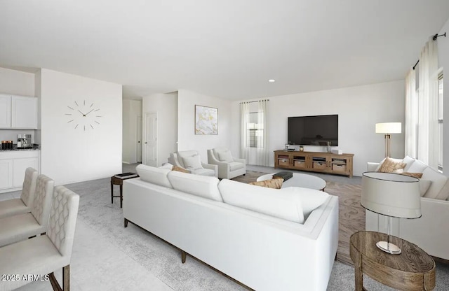 living room featuring recessed lighting