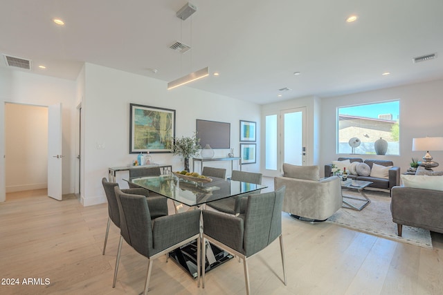 dining area featuring light hardwood / wood-style flooring