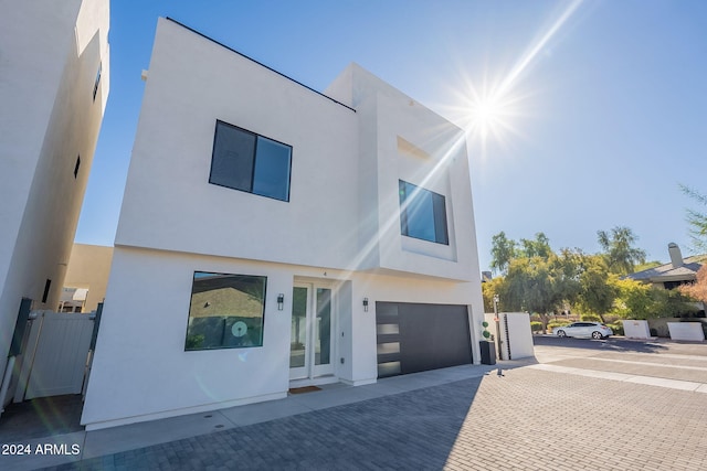 view of front of house featuring french doors and a garage