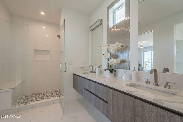 bathroom with vanity and walk in shower