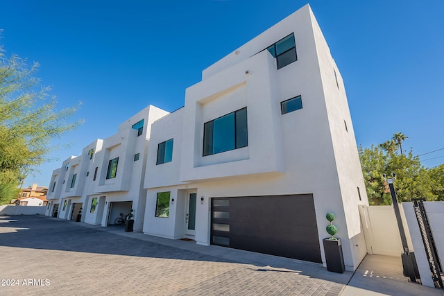 view of front of property featuring a garage