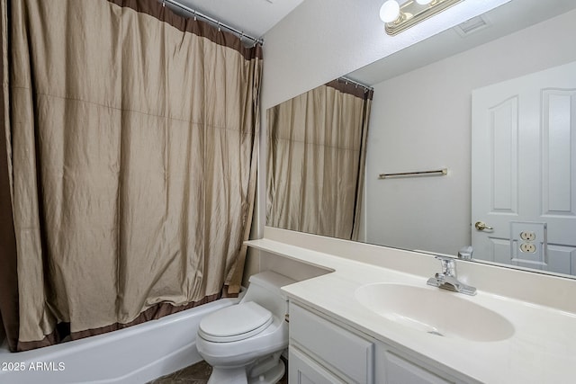 full bathroom featuring shower / tub combo, vanity, and toilet