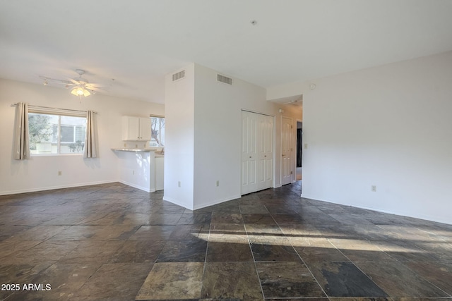 spare room featuring ceiling fan