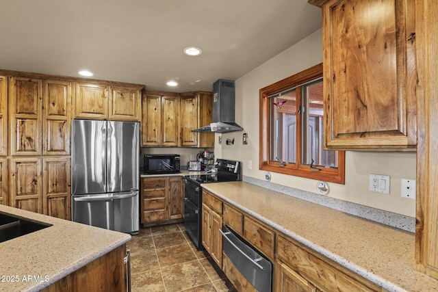 kitchen with wall chimney exhaust hood, light stone counters, and black appliances