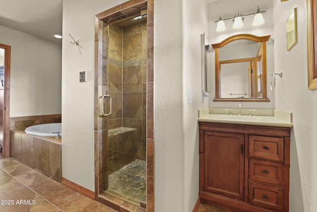 bathroom with vanity, tile patterned flooring, and separate shower and tub