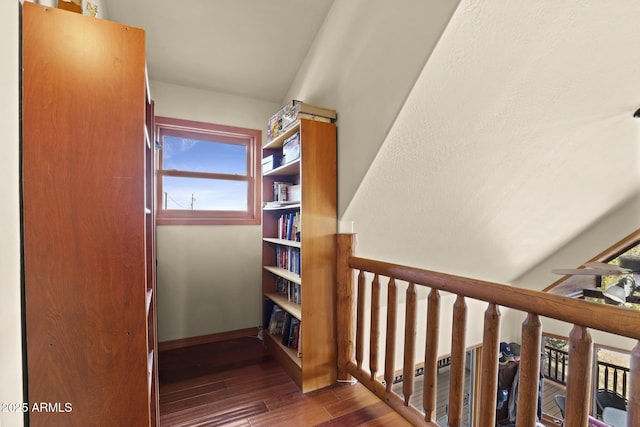 stairs with wood-type flooring