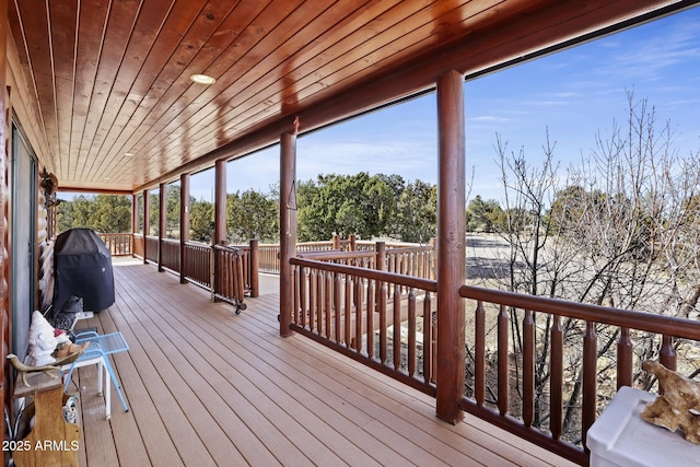 wooden deck with area for grilling