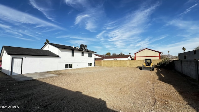 view of yard with cooling unit and a fenced backyard