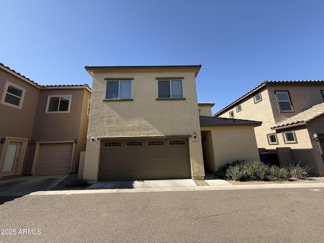 view of front of property featuring a garage