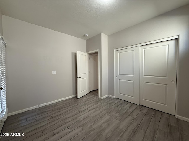 unfurnished bedroom featuring a closet