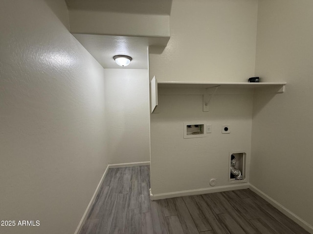 washroom featuring hookup for a washing machine, gas dryer hookup, dark wood-type flooring, and hookup for an electric dryer