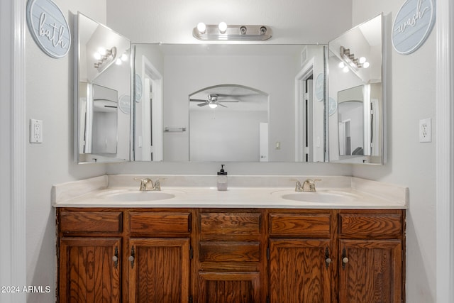 bathroom featuring vanity and ceiling fan