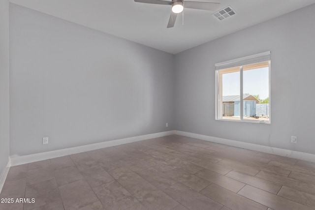1724 N Main Dr, Apache Junction, AZ 85120 - empty room featuring a ceiling fan and baseboards