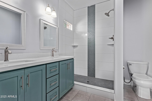 1724 N Main Dr, Apache Junction, AZ 85120 - bathroom featuring double vanity, toilet, tiled shower, and tile patterned floors
