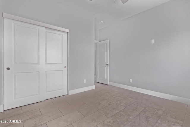 1724 N Main Dr, Apache Junction, AZ 85120 - unfurnished bedroom featuring a closet, baseboards, and ceiling fan