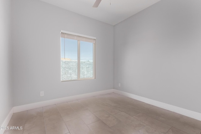 1724 N Main Dr, Apache Junction, AZ 85120 - spare room with ceiling fan and baseboards