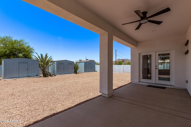1724 N Main Dr, Apache Junction, AZ 85120 - view of patio / terrace featuring french doors, ceiling fan, and a water view