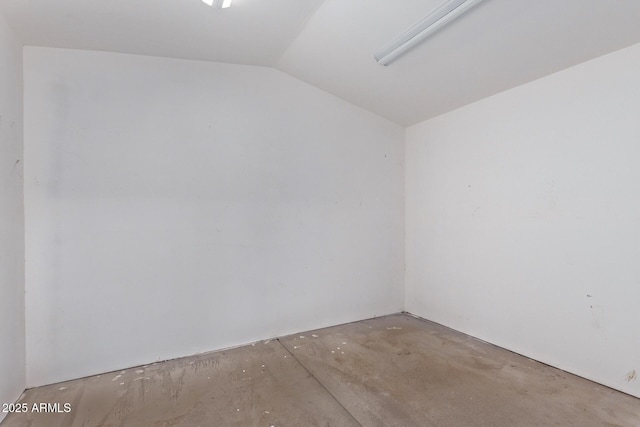 1724 N Main Dr, Apache Junction, AZ 85120 - empty room with lofted ceiling and unfinished concrete flooring