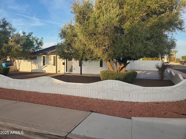 view of front of home with fence