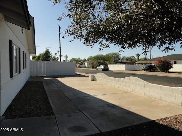 view of patio / terrace featuring fence