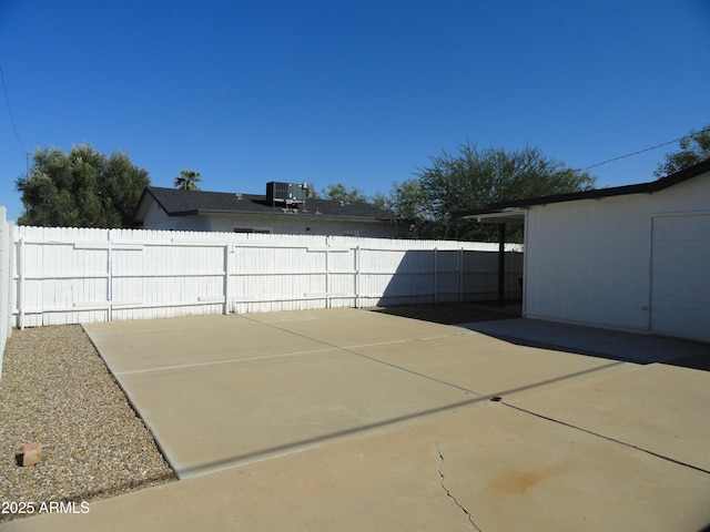 view of patio / terrace featuring central AC and a fenced backyard
