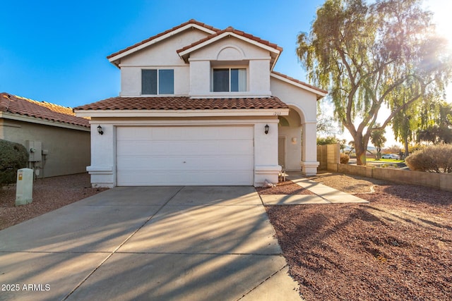 view of front of property with a garage