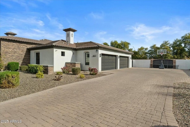 view of front of home with a garage