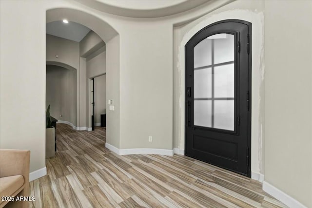 entrance foyer featuring light wood-type flooring