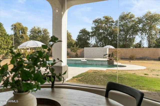 view of swimming pool with an in ground hot tub and a patio area