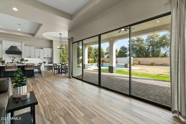 doorway to outside with light hardwood / wood-style flooring