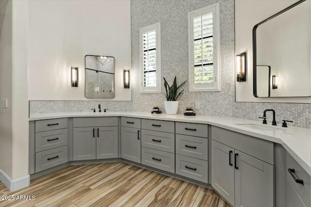 bathroom featuring hardwood / wood-style floors and vanity