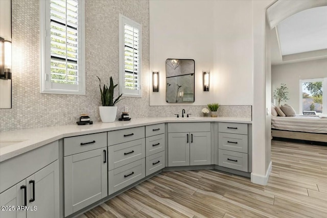 bathroom featuring hardwood / wood-style floors and vanity