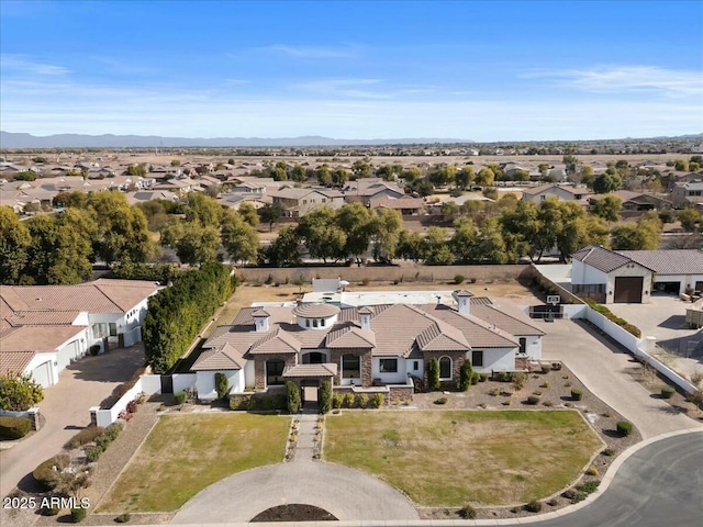 drone / aerial view featuring a mountain view