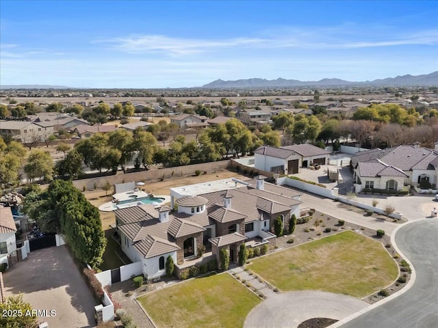 drone / aerial view featuring a mountain view