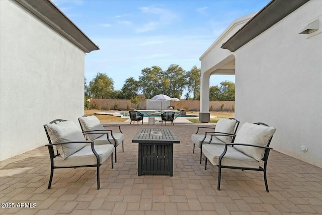 view of patio / terrace featuring a fenced in pool