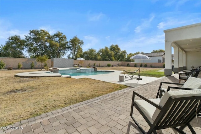 view of swimming pool featuring a lawn, an in ground hot tub, and a patio