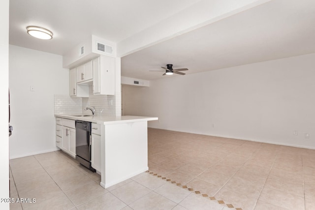 kitchen with ceiling fan, black dishwasher, light tile patterned floors, tasteful backsplash, and visible vents