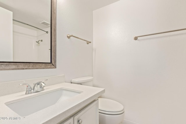 full bath with toilet, visible vents, a shower, and vanity