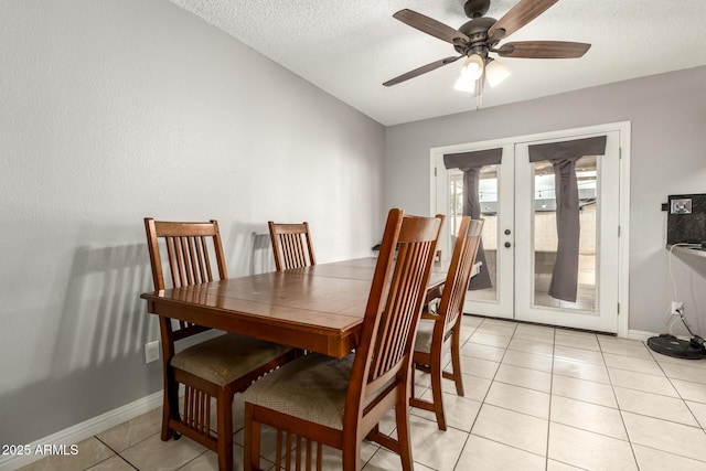6426 W Lamar Rd, Glendale, AZ 85301 - dining area with a ceiling fan, french doors, baseboards, a textured ceiling, and light tile patterned floors
