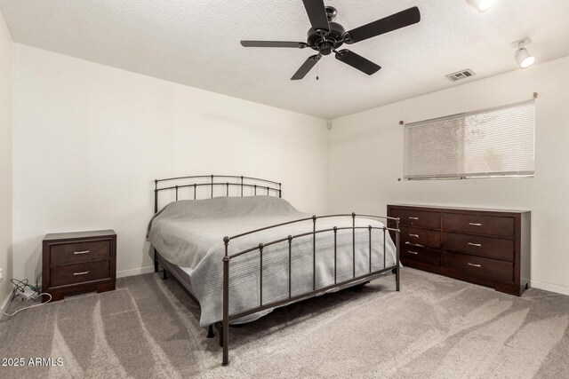 6426 W Lamar Rd, Glendale, AZ 85301 - bedroom featuring carpet floors, baseboards, a ceiling fan, and a textured ceiling