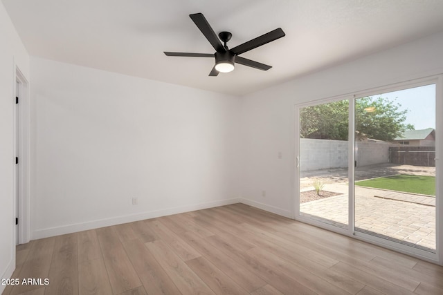 2443 E Randall Dr, Tempe, AZ 85288 - empty room with light wood-type flooring, a ceiling fan, and baseboards