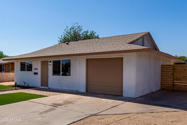 2443 E Randall Dr, Tempe, AZ 85288 - ranch-style home with roof with shingles, concrete driveway, and an attached garage