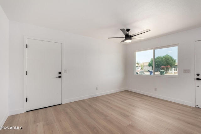2443 E Randall Dr, Tempe, AZ 85288 - entrance foyer with ceiling fan, light wood finished floors, and baseboards